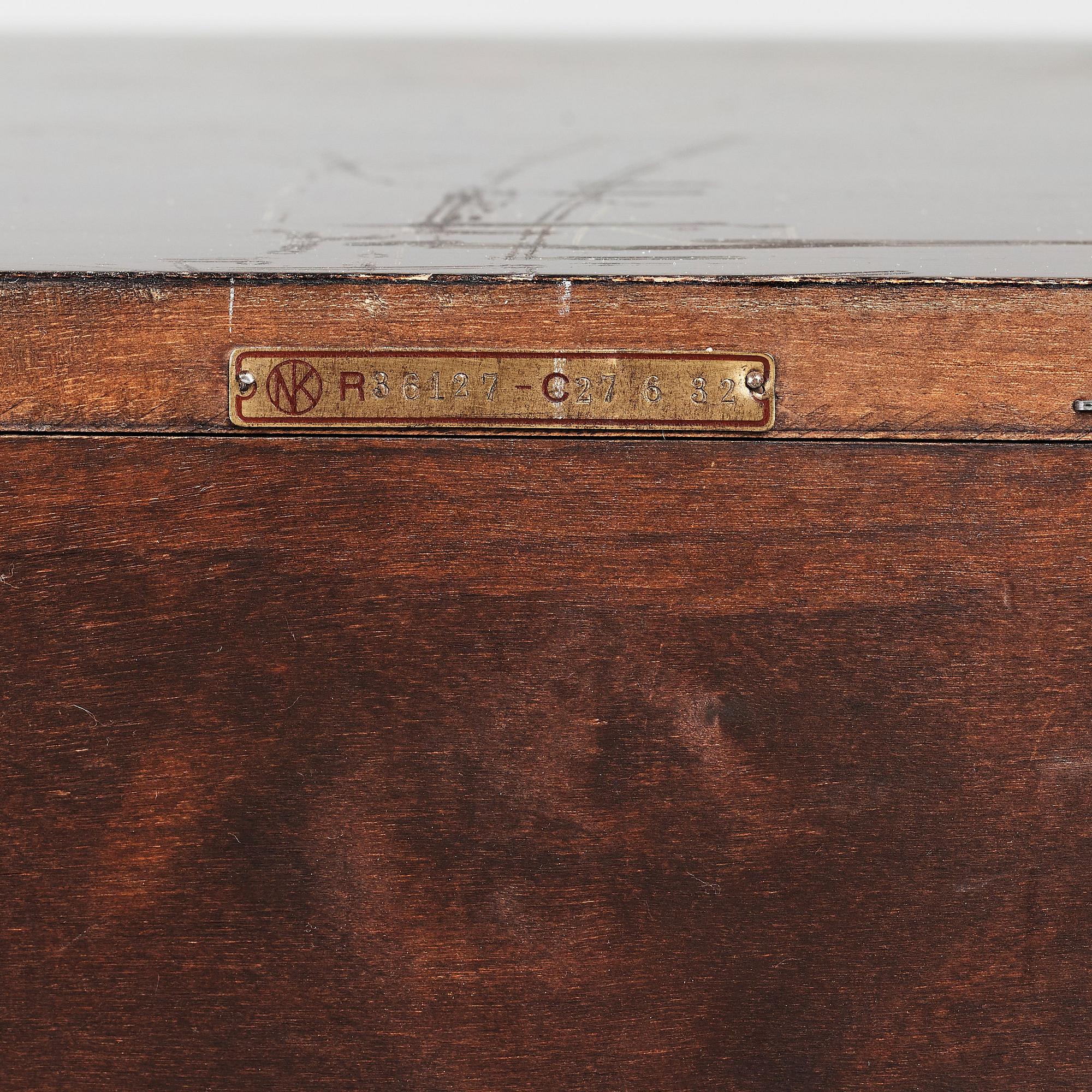 Axel Einar Hjorth, a darkly stained birch sideboard,"Typenko", Nordiska Kompaniet, Sweden 1932.