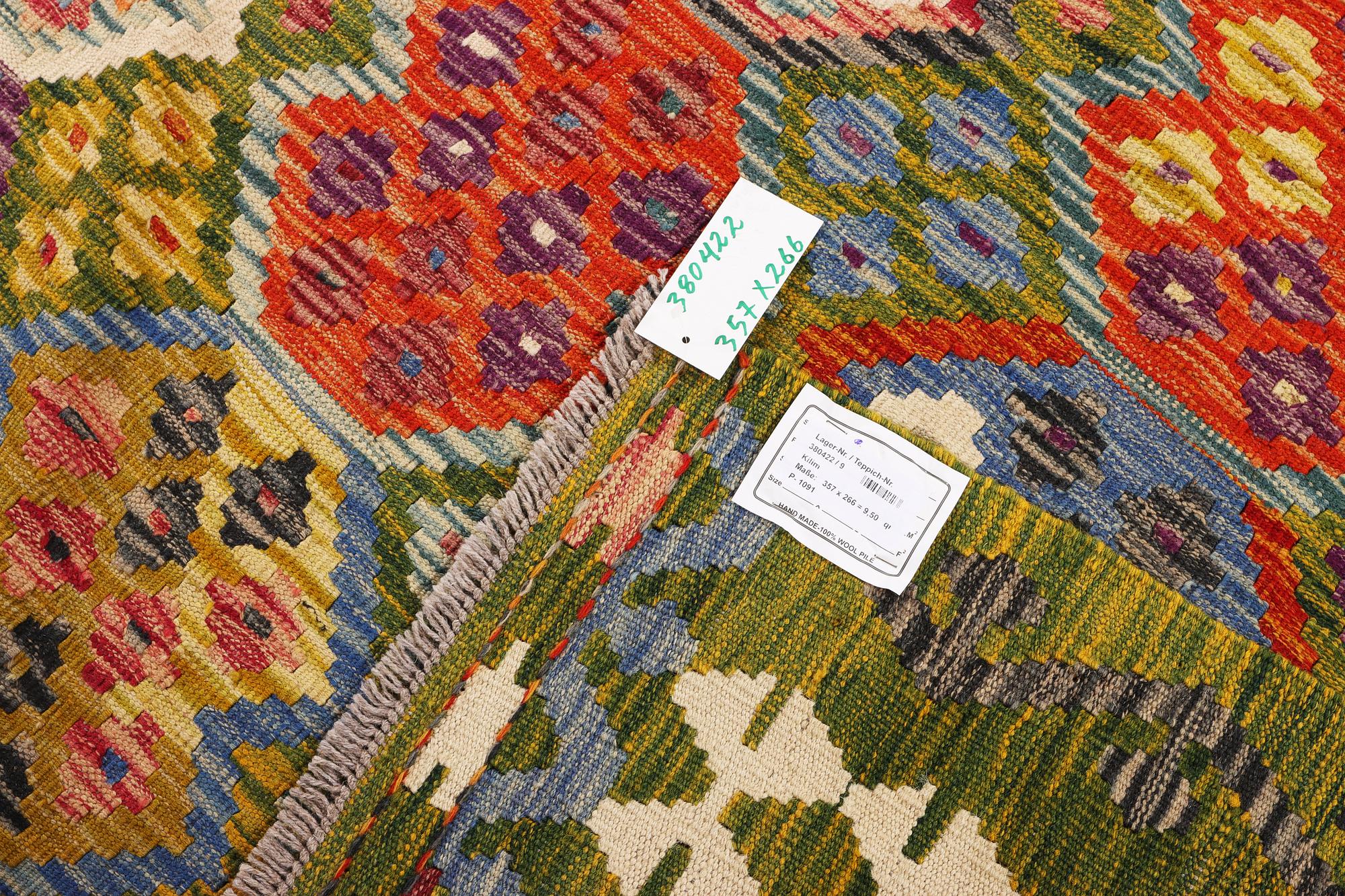 An Afghan Kilim carpet, c. 357 x 266 cm.
