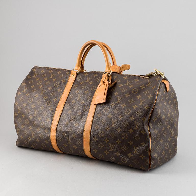 Louis Vuitton, a monogram canvas 'Keepall 55' weekend bag and toilet bag.