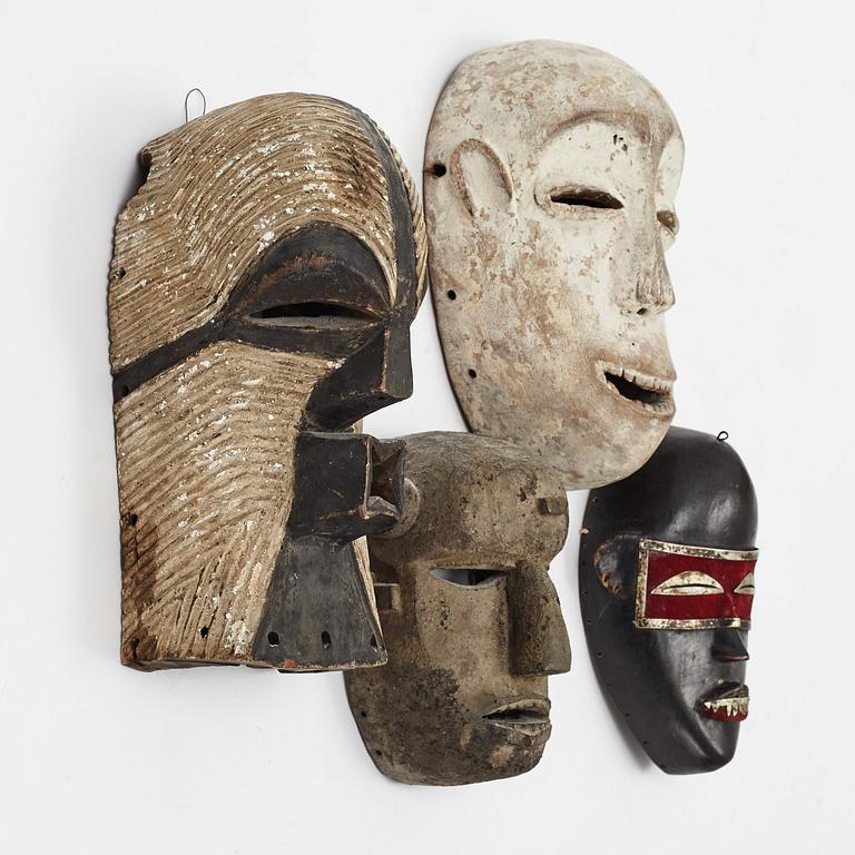 Masker, 4 st, enligt uppgift Dan, Liberia, Ibibio, Nigeria, Varega, Kongo, Songe, Kongo, 1900-talets andra hälft.