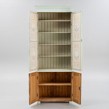 A painted cabinet, circa 1900.
