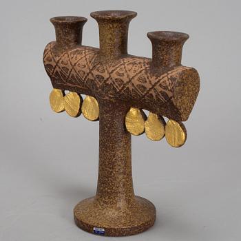 LISA LARSON, a stoneware candelabra and a figurine. Gustavsberg.