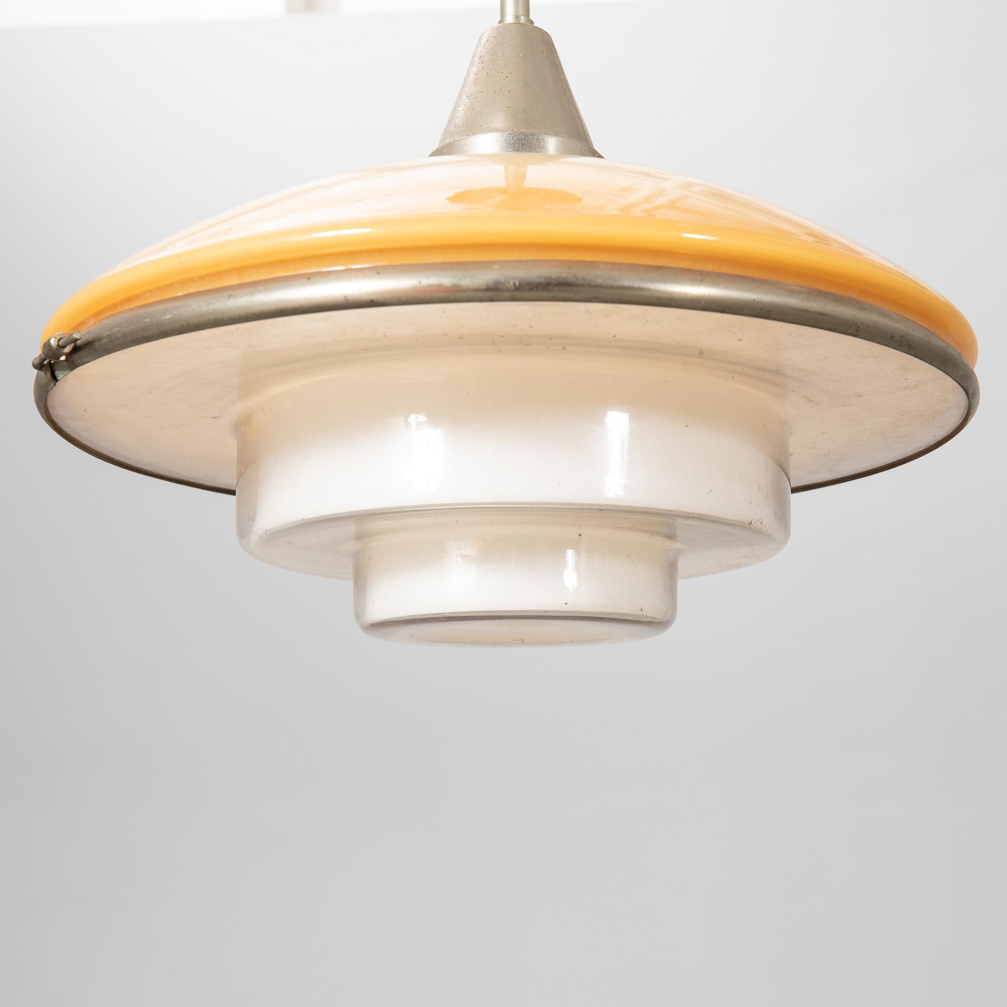 Otto Müller, Taklampa, "Sistrah-pendel", Megaphos, 1900-talets första hälft.