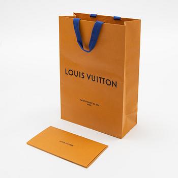 Louis Vuitton, a monogram silk and wool mix shawl.