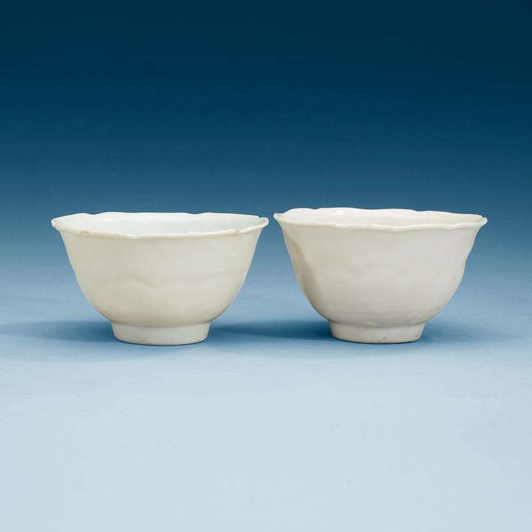 A pair of white glazed bowls, Ming dynasty, with Chenghua six character mark.