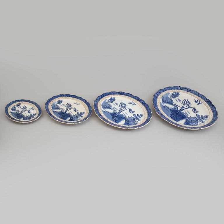 A part dinner and tea earthenware service, 'Real old Willow', Booths, England, first half of the 20th century (117 ps).