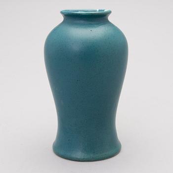 A ceramic vase signed A.W.F.