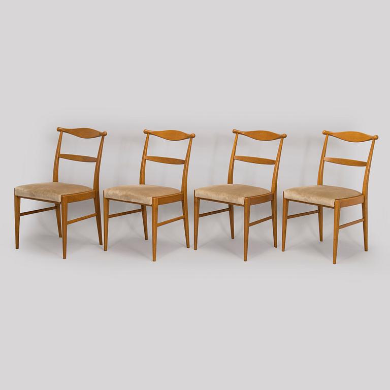 A set of four 1960s oak chairs.
