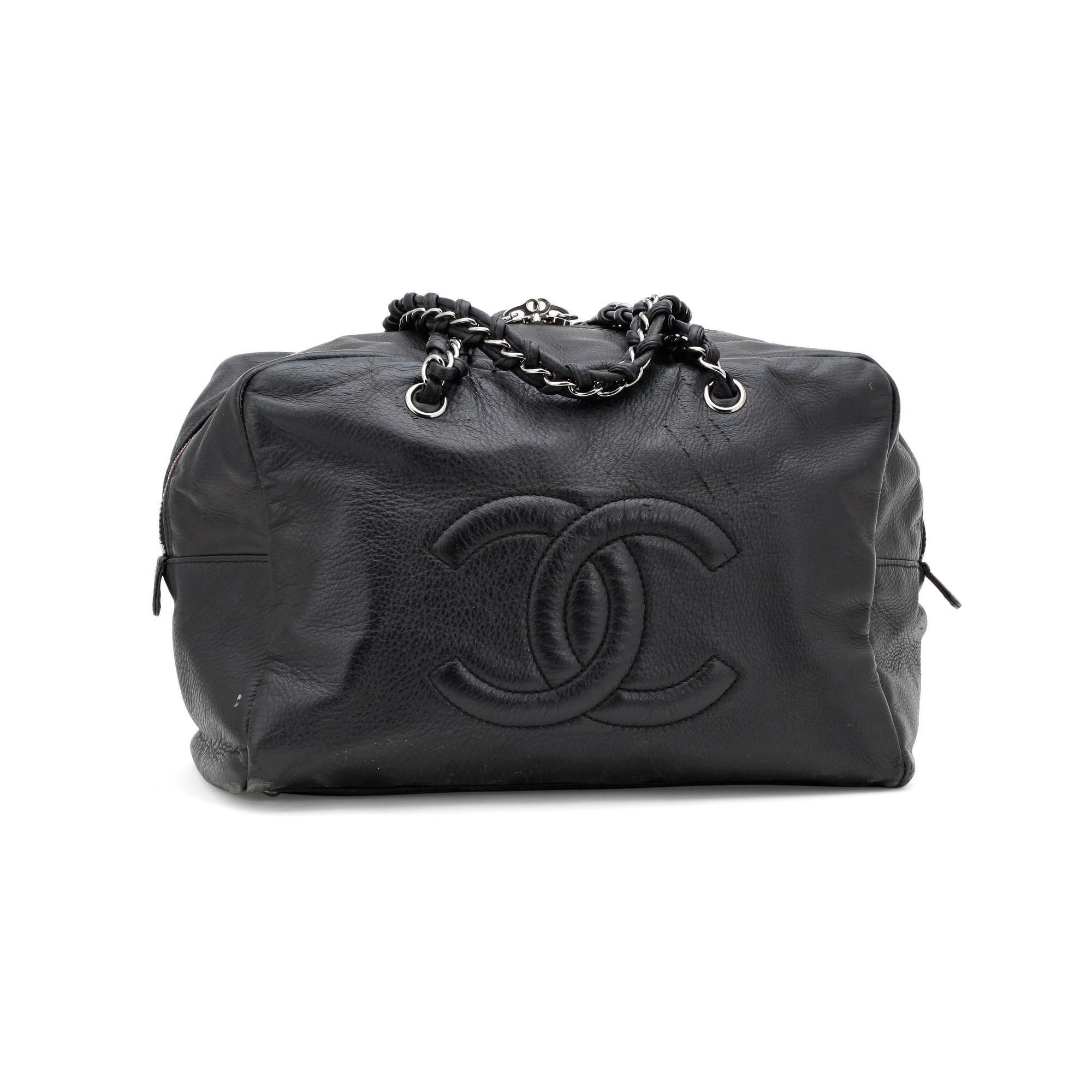 CHANEL, a black leather shoulder bag.