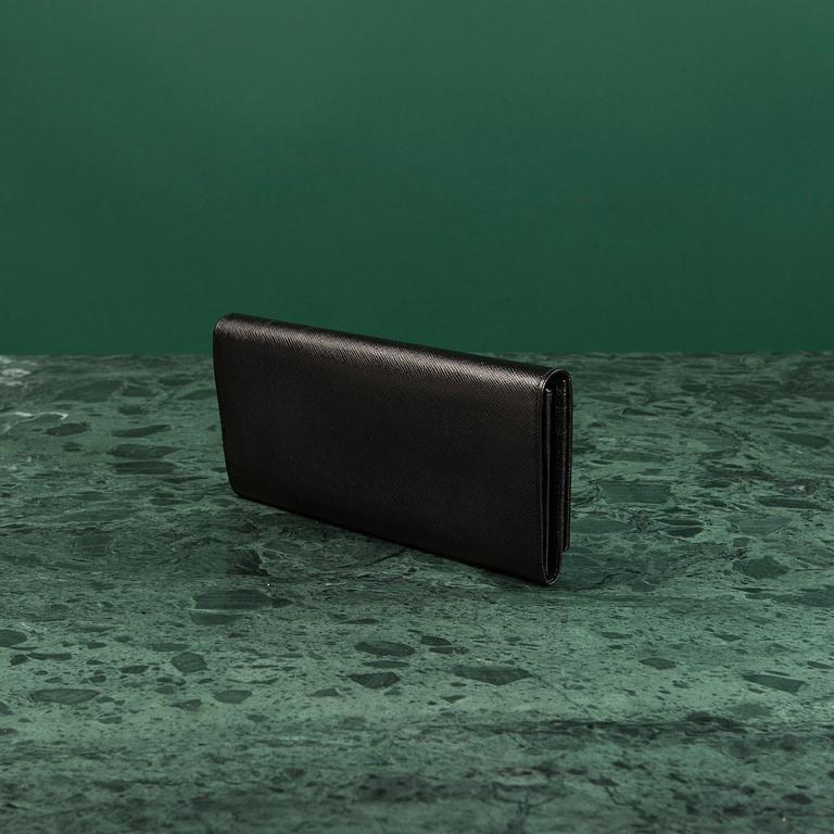 PLÅNBOK, Prada.