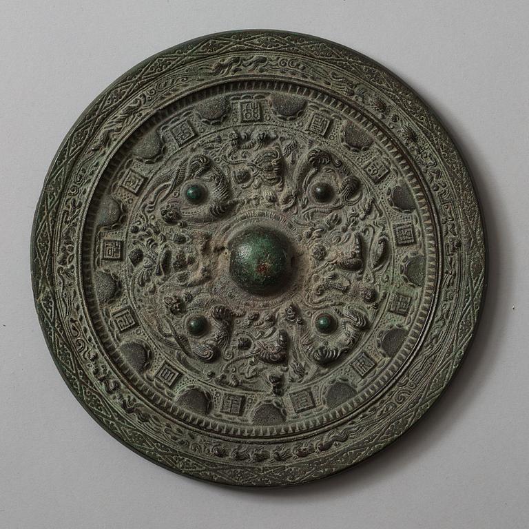 Two bronze mirrors, Six dynasties (220-589) and Tang dynasty (618-907).