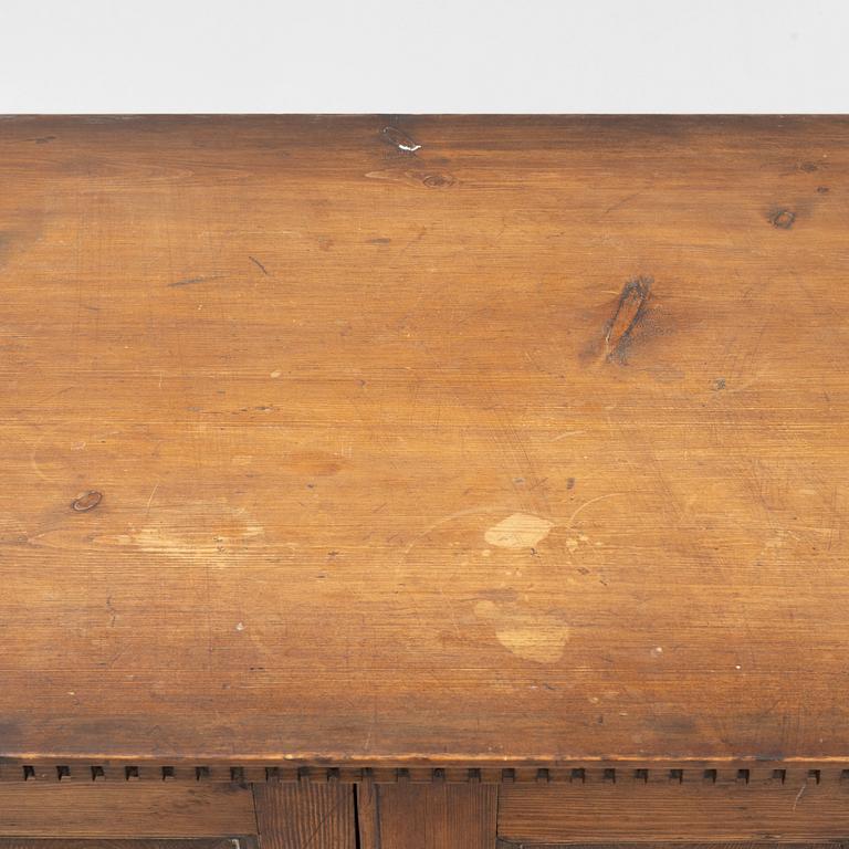 A Gustavian pine cupboard, late 18th century.