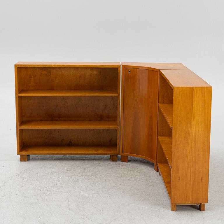 A corner bookcase, three sections, 1940's.