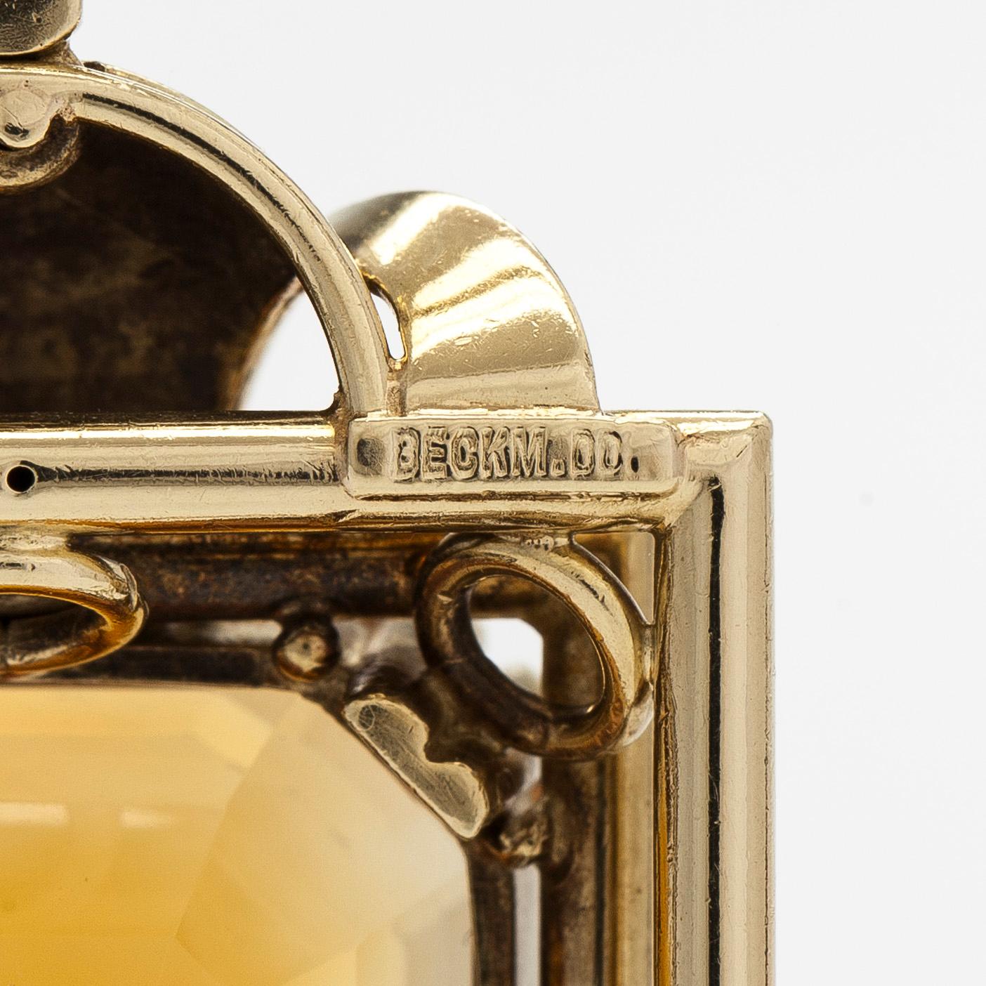 Necklace with pendant, 14K gold and a faceted citrine.