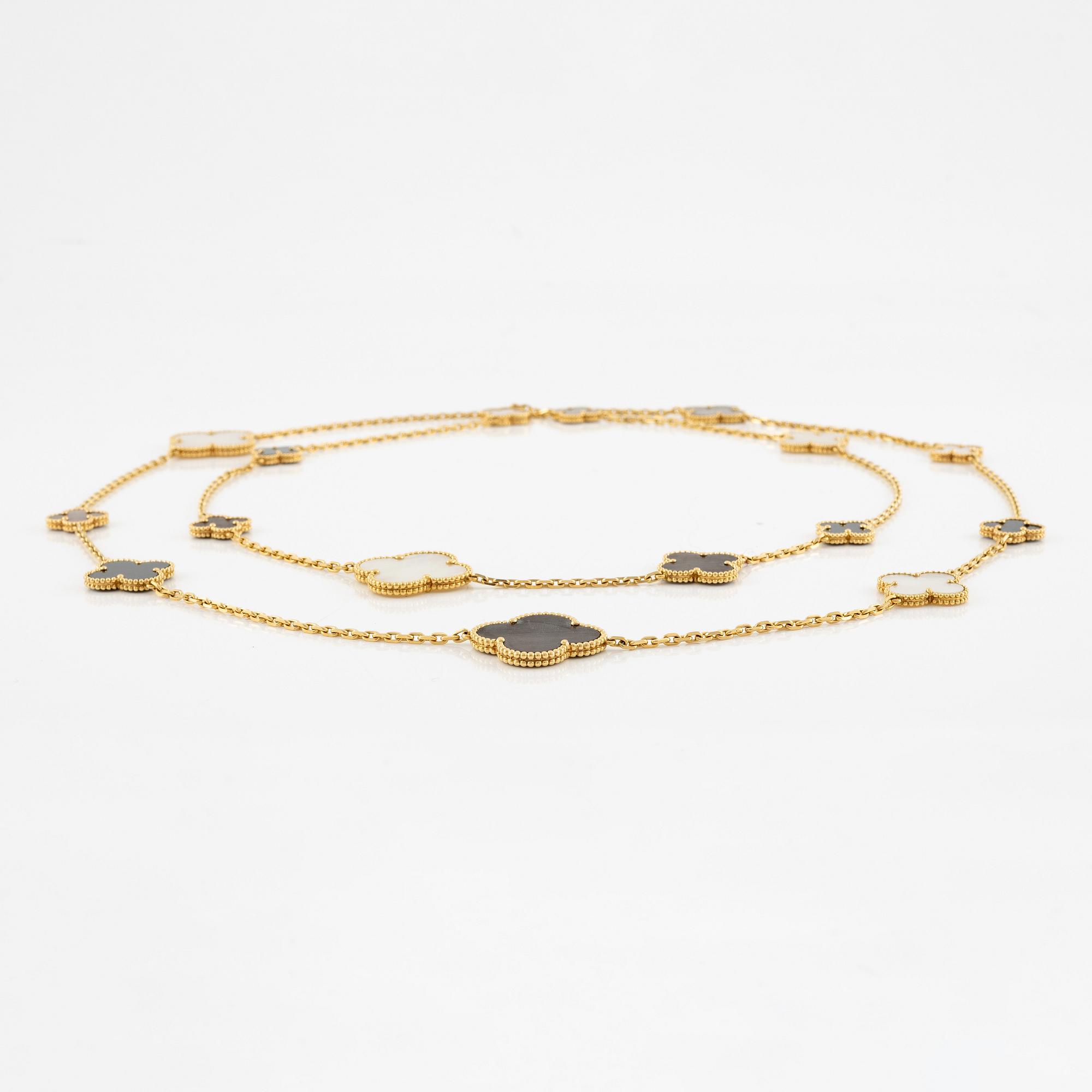 A Van Cleef & Arpels "Alhambra" necklace 18K gold with mother-of-pearl and onyx.