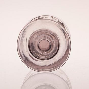 A WINE GLASS.