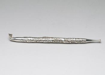 A Japanese silver opium pipe, Meiji period (1868-1912).