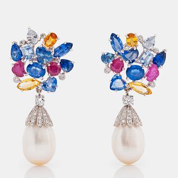 1314. A pair of cultured pearl, sapphire, ruby and diamond earrings.