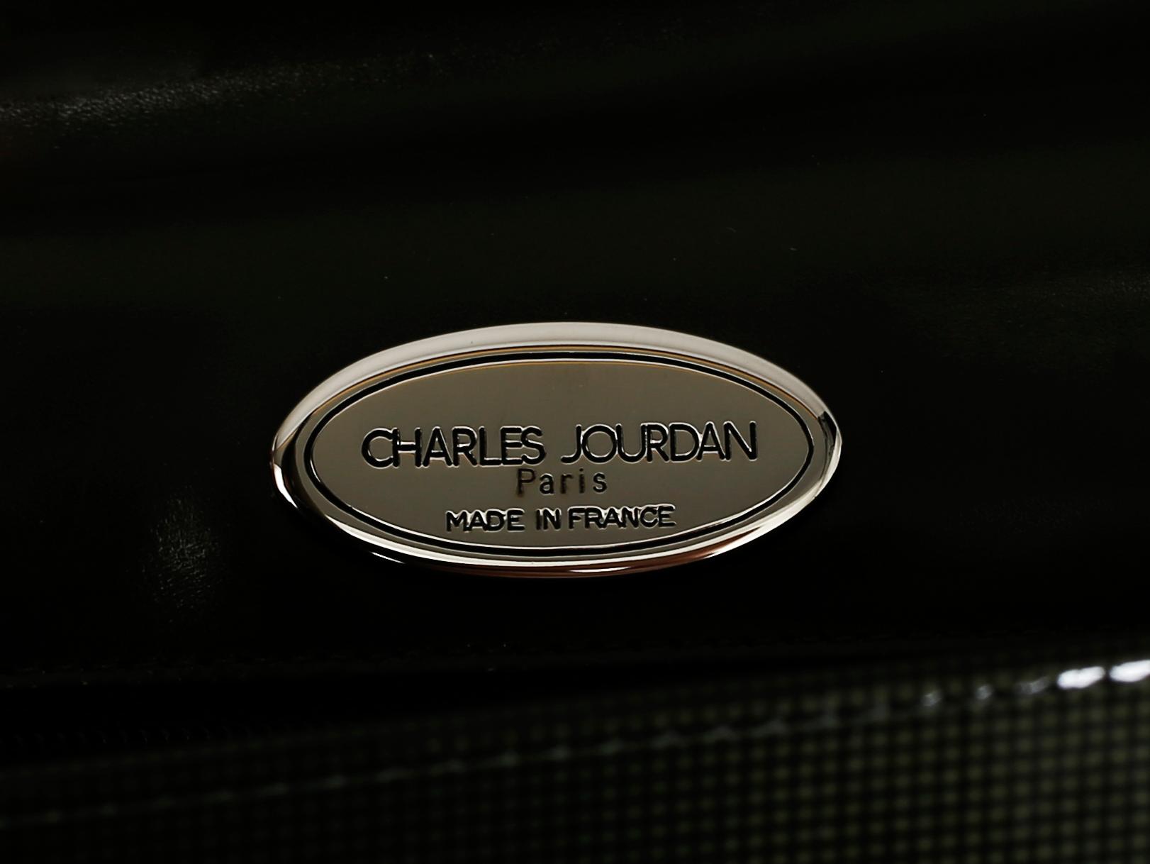 VÄSKA samt SKOR, Charles Jourdan, Paris.