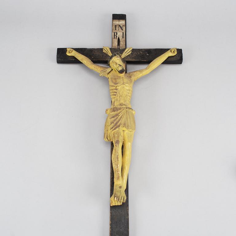 A wooden painted crucifix, 18th/19th century.