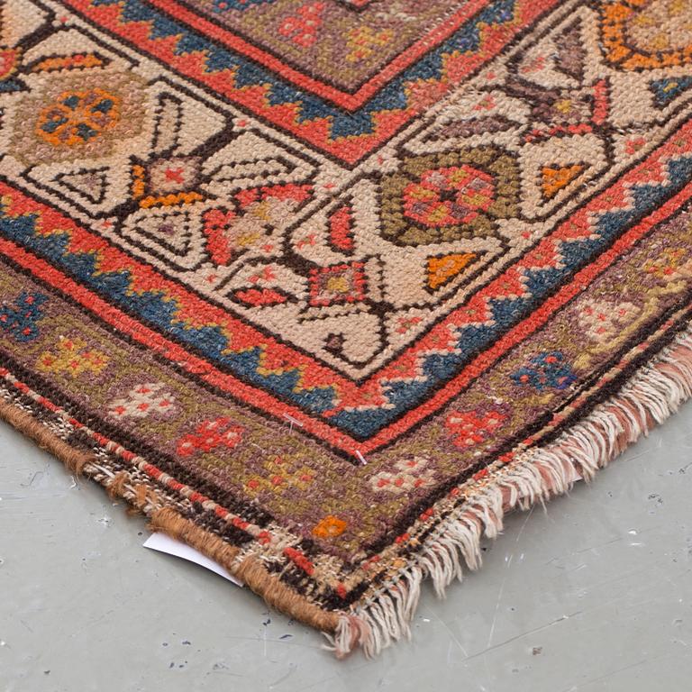 A semi-antique Malajir runner, around 245 x 95 cm.