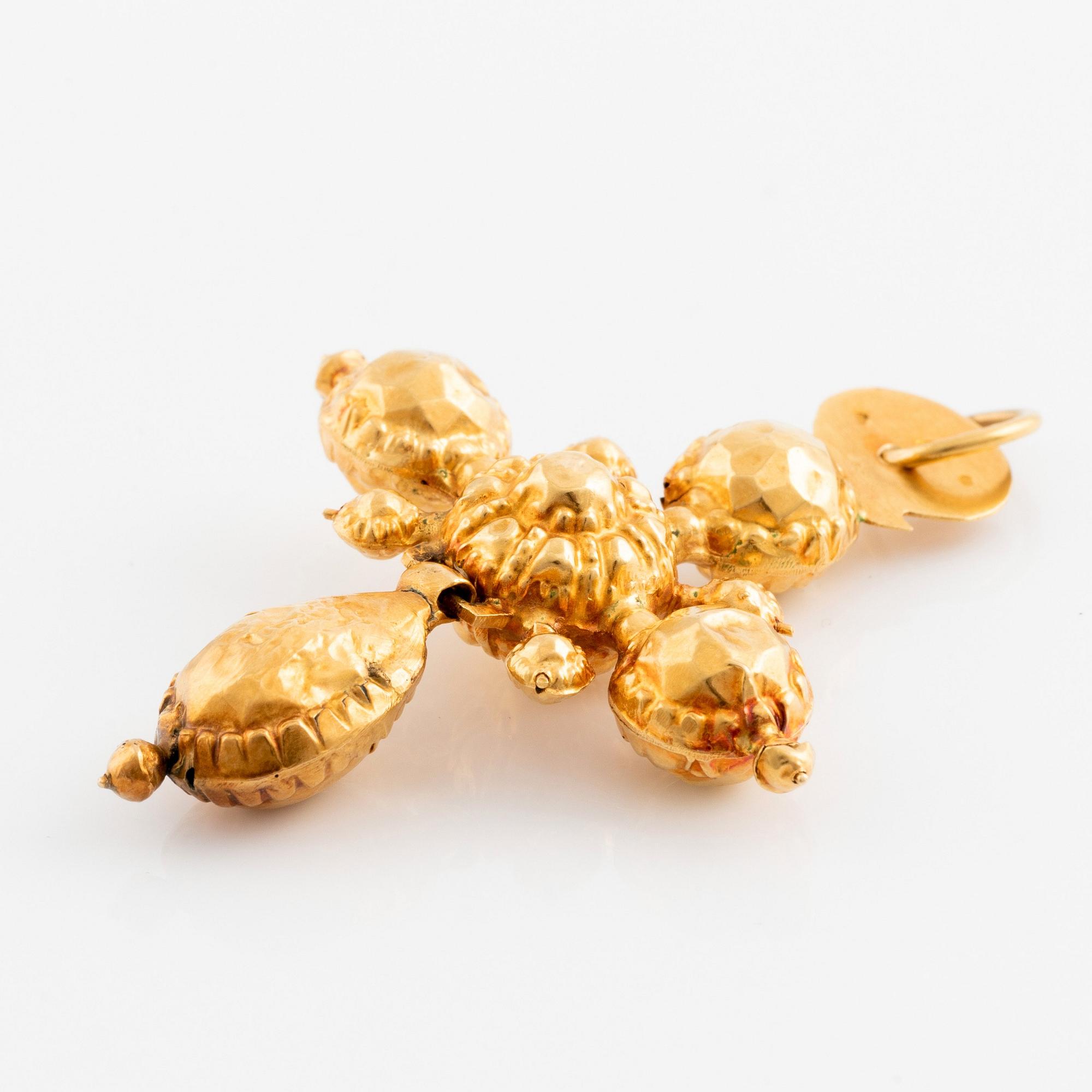 Hängsmycke 18K guld i form av ett kors.