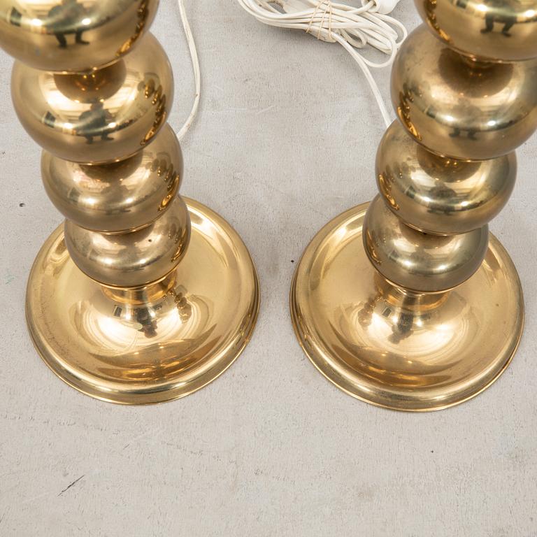A pair of GMA brass table lamps.