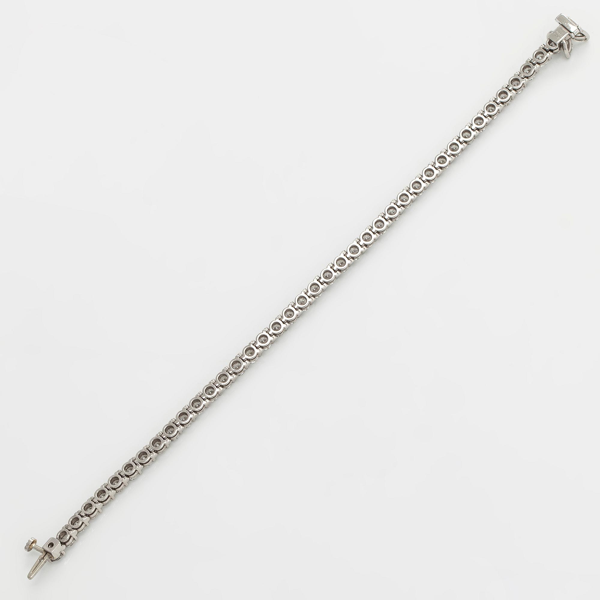 Tiffany & Co, "Victoria" tennisrannekoru, platinaa sekä briljantti- ja marquisehiottuja timantteja.