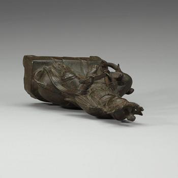 A seated bronze figure of Guanyin on an elephant, Qing dynasty, 19th Century.
