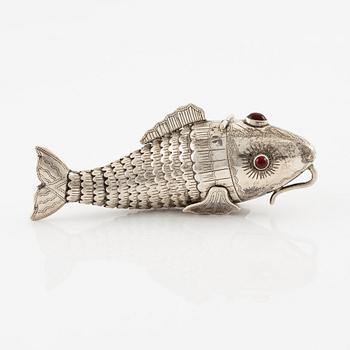 Pendant in the form of a fish, silver with red stones.