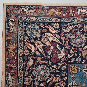 A CARPET, an antique/semi-antique Tabriz part silk figural, ca 345-346 x 217,5-232 cm.