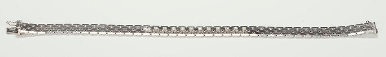 ARMBAND, briljantslipade diamanter ca 0.33 ct. 18K vitguld. Italien 1960-tal. Vikt 24,4 g.