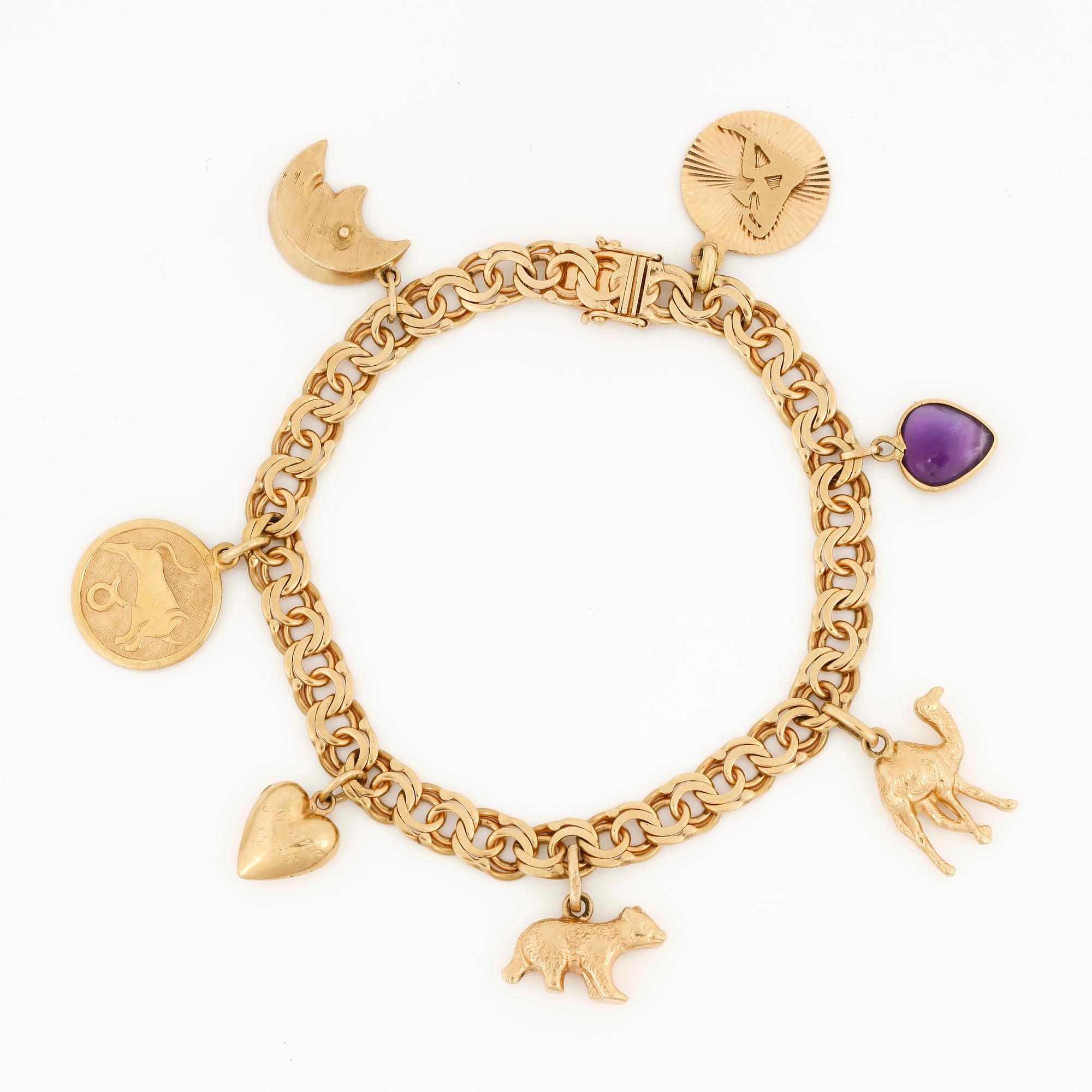 ARMBAND, 18 k guld, med ametist, 1952. Totalvikt ca 21 gram.