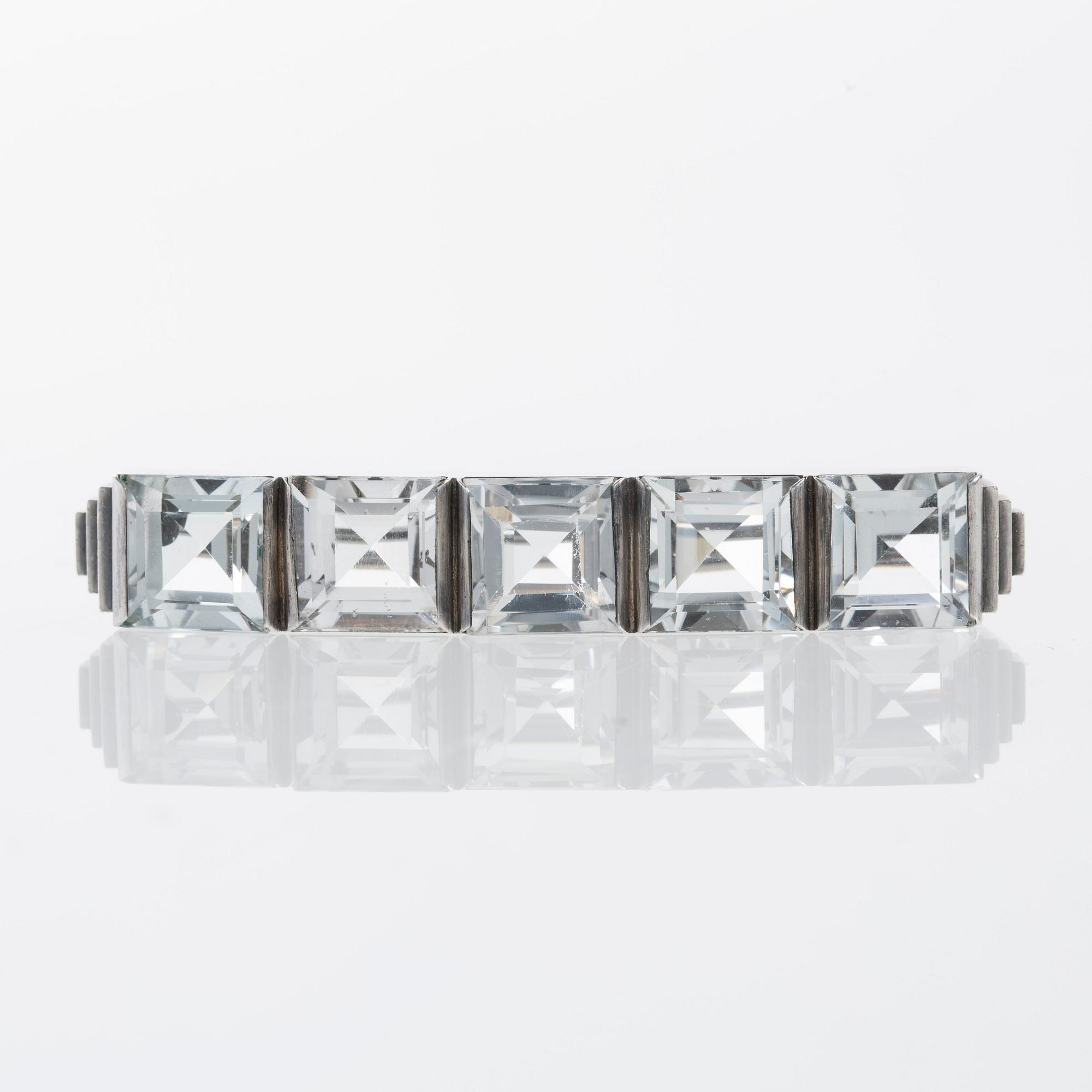 BROSCH, Wiwen Nilsson, Lund, 1944. Sterlingsilver med bergkristaller,