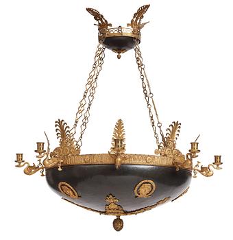120. A presumably Russian Empire gilt and patinated bronze nine-branch chandelier, 19th century.