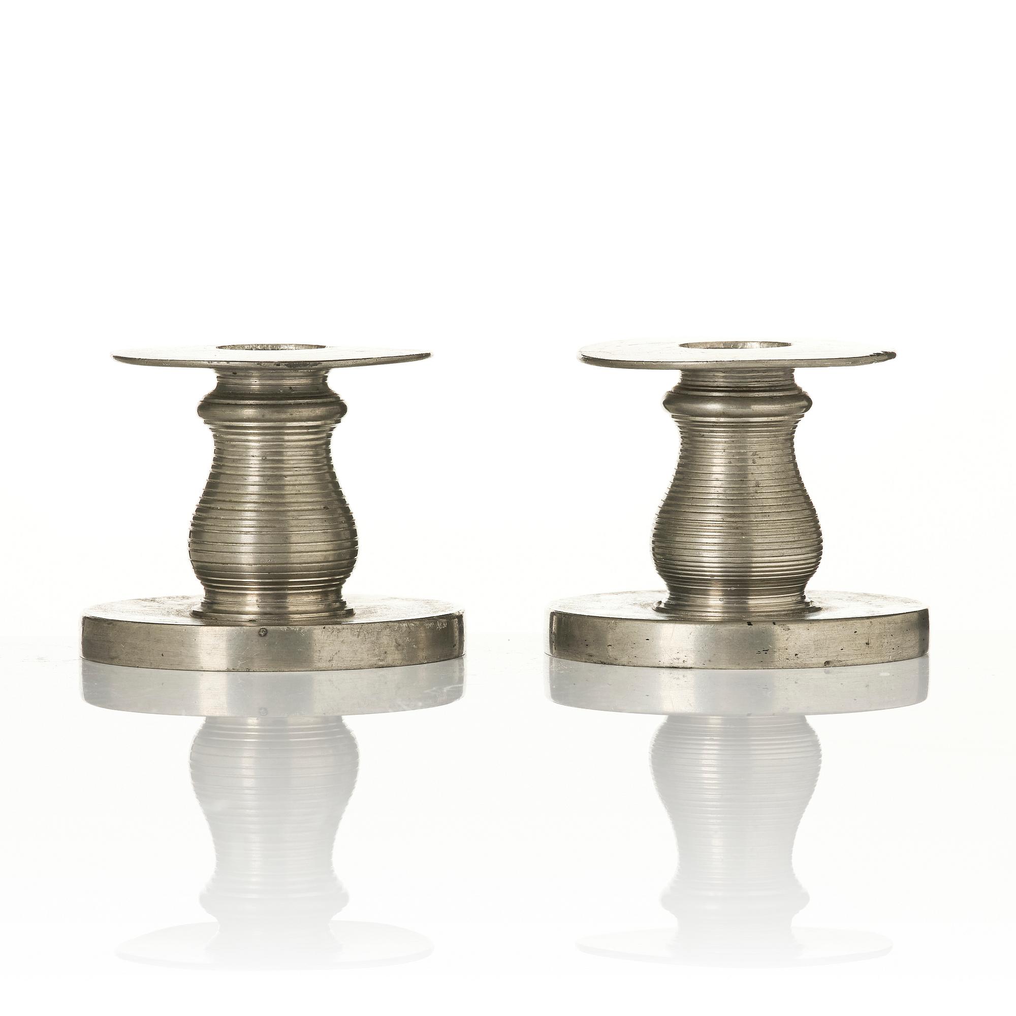 Nils Fougstedt, a pair of candlesticks model 1189, Firma Svenskt Tenn, Stockholm, 1929.