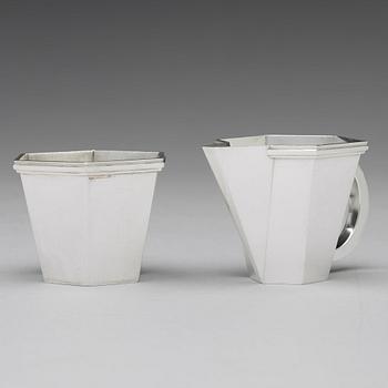 Wiwen Nilsson, a sterling set with tray, creamer, sugar bowl and a pair of tongues, Lund, Sweden 1964-69.