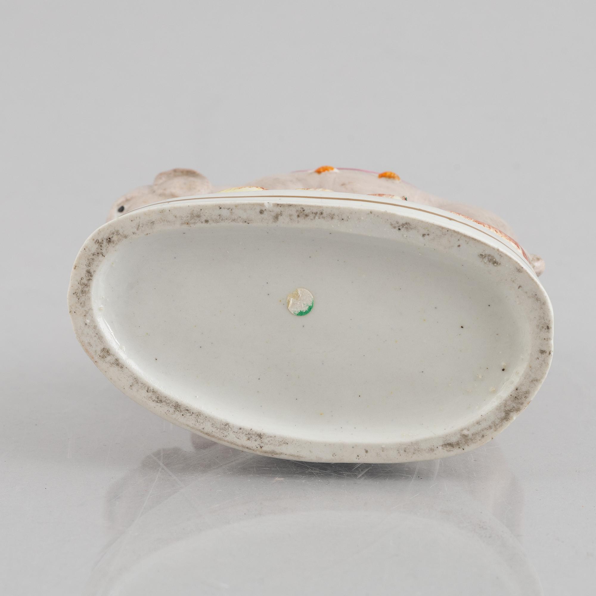 An elephant spill vase, Staffordshire, England, 19th century.