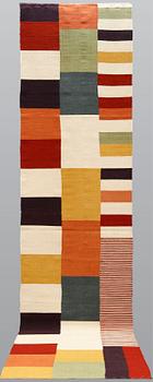 A runner, flat weave, ca 488 x 82 cm.