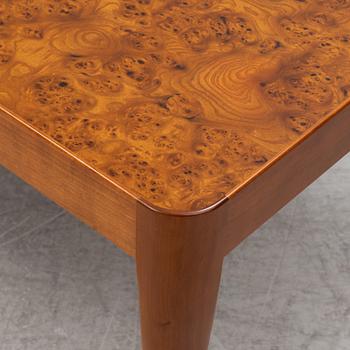 A Josef Frank mahogany and elm root model 2073 coffee table, designed 1949.