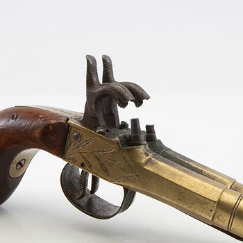 Double-barrel percussion pistol with bayonet, 19th century.