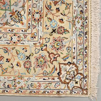 A silk rug from possibly from Kashan, 201 x 139 cm.