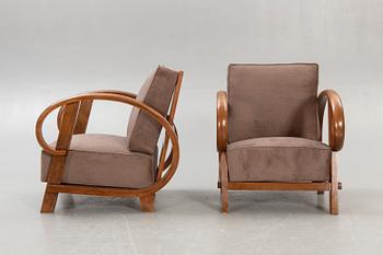 A pair of Art deco easy chairs.