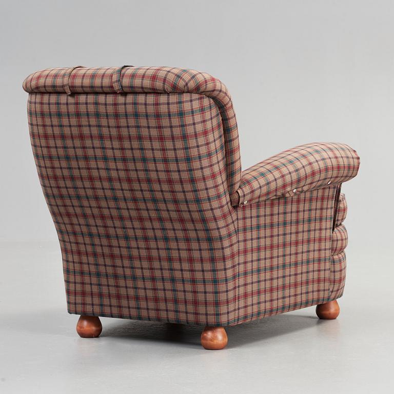 Josef Frank, a 'model 336' armchair, by Svenskt Tenn, Sweden.