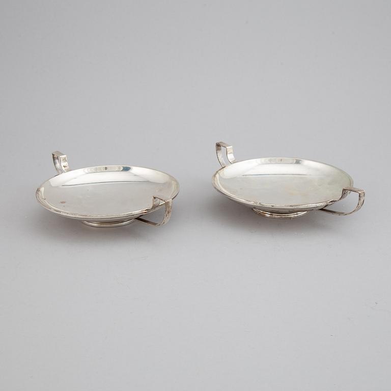 A pair of sterling silver tazzaz.