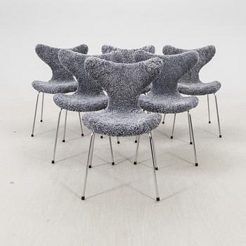 Arne Jacobsen, a set of six "Måsen/Liljan" sheepskin chairs from Fritz Hansen Denmark.