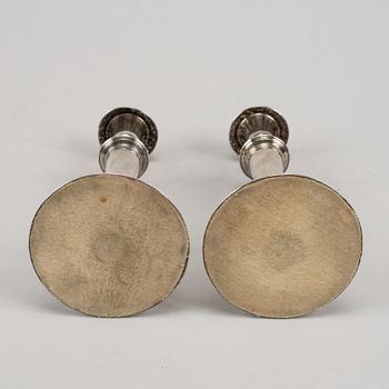 A pair of 19th century silver-plated candlesticks.