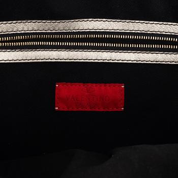 Valentino Garavani, A metallic leather bag.