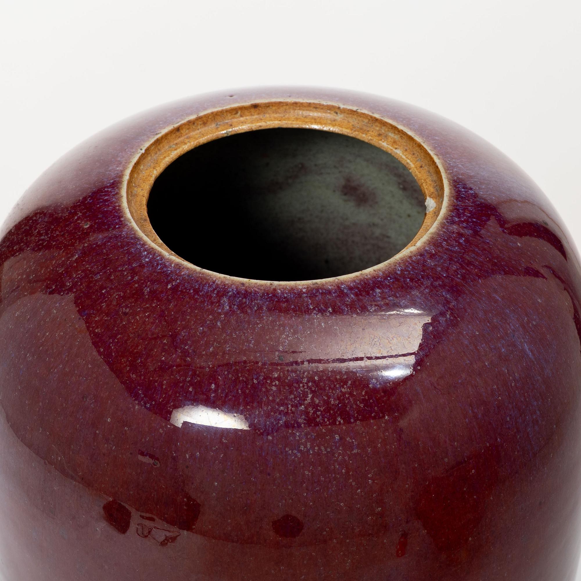 A pot with cover in sang de boeuf, Qing dynasty.