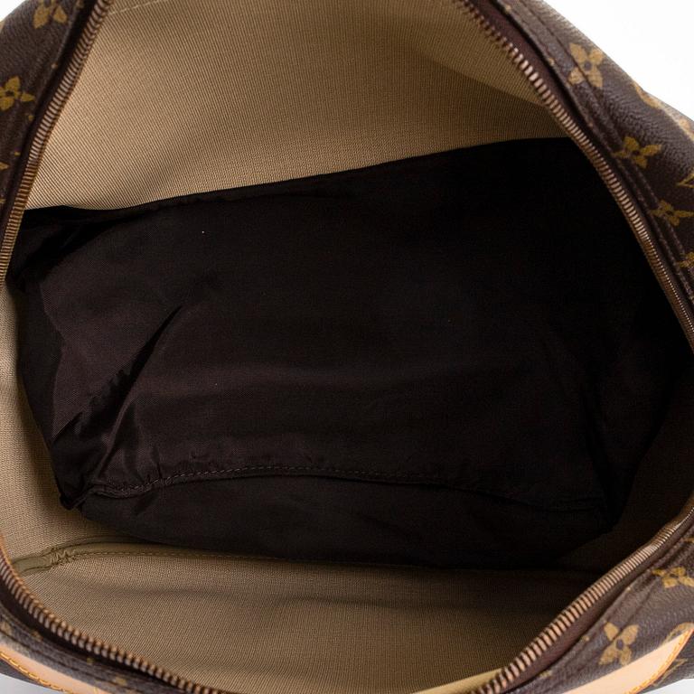 Louis Vuitton, a Monogram Canvas 'Evasion' weekend bag.
